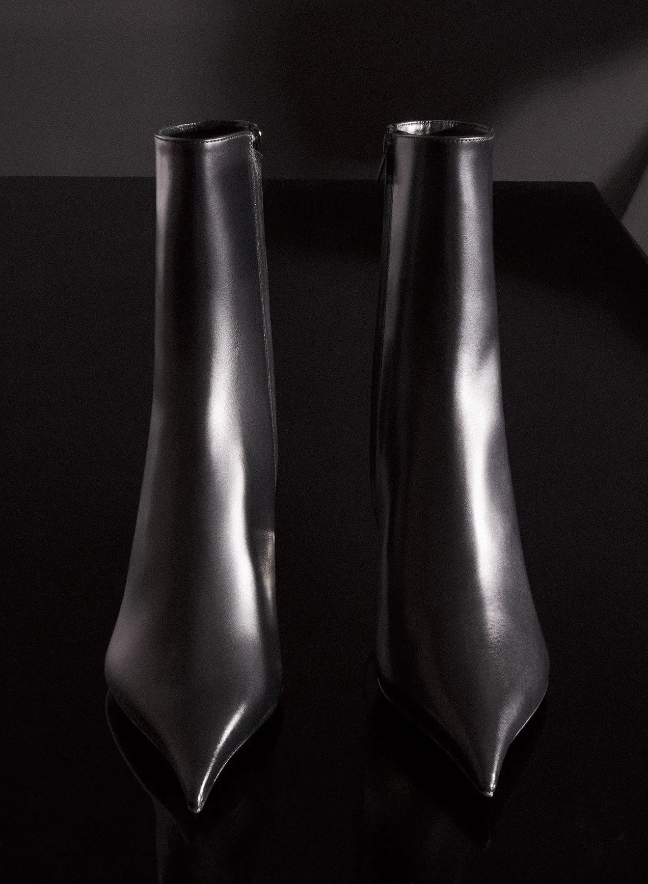 Black leather Fang 55 ankle boots