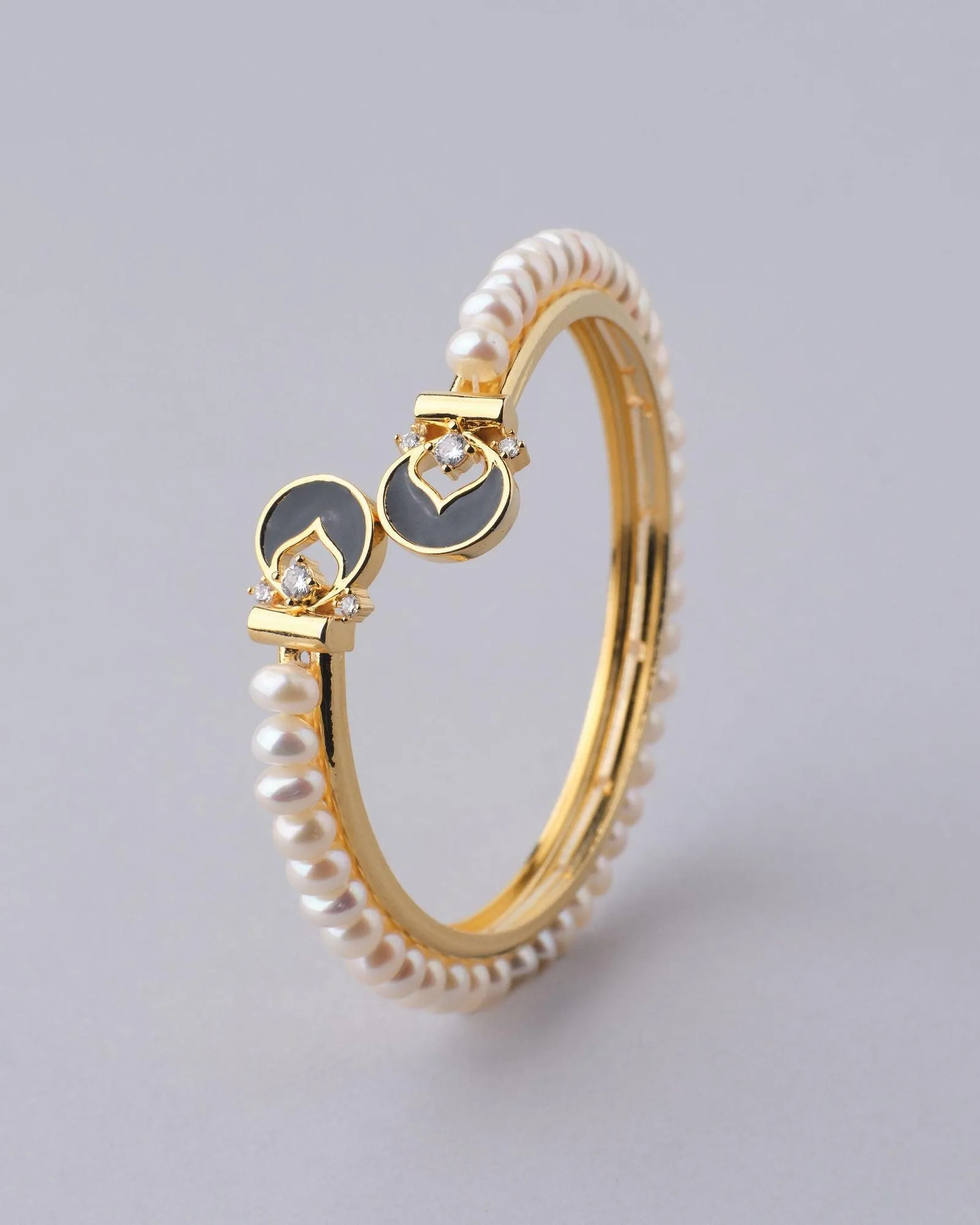 Fashionable Stone Studded Pearl Bangle